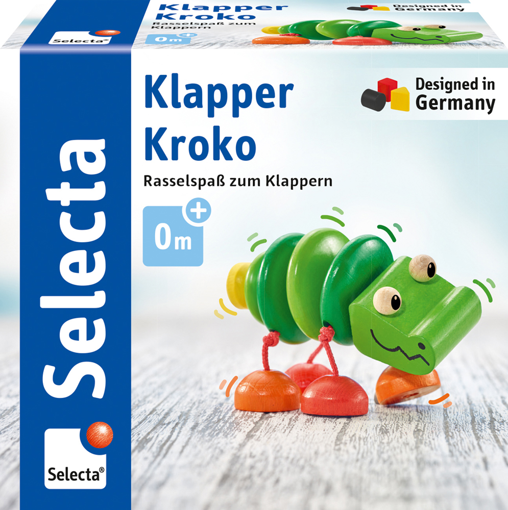 Verpakking voor een houten rammelaar van Selecta Klapper Kroko met ‘rammelplezier’ om mee te rammelen, voor pasgeborenen.