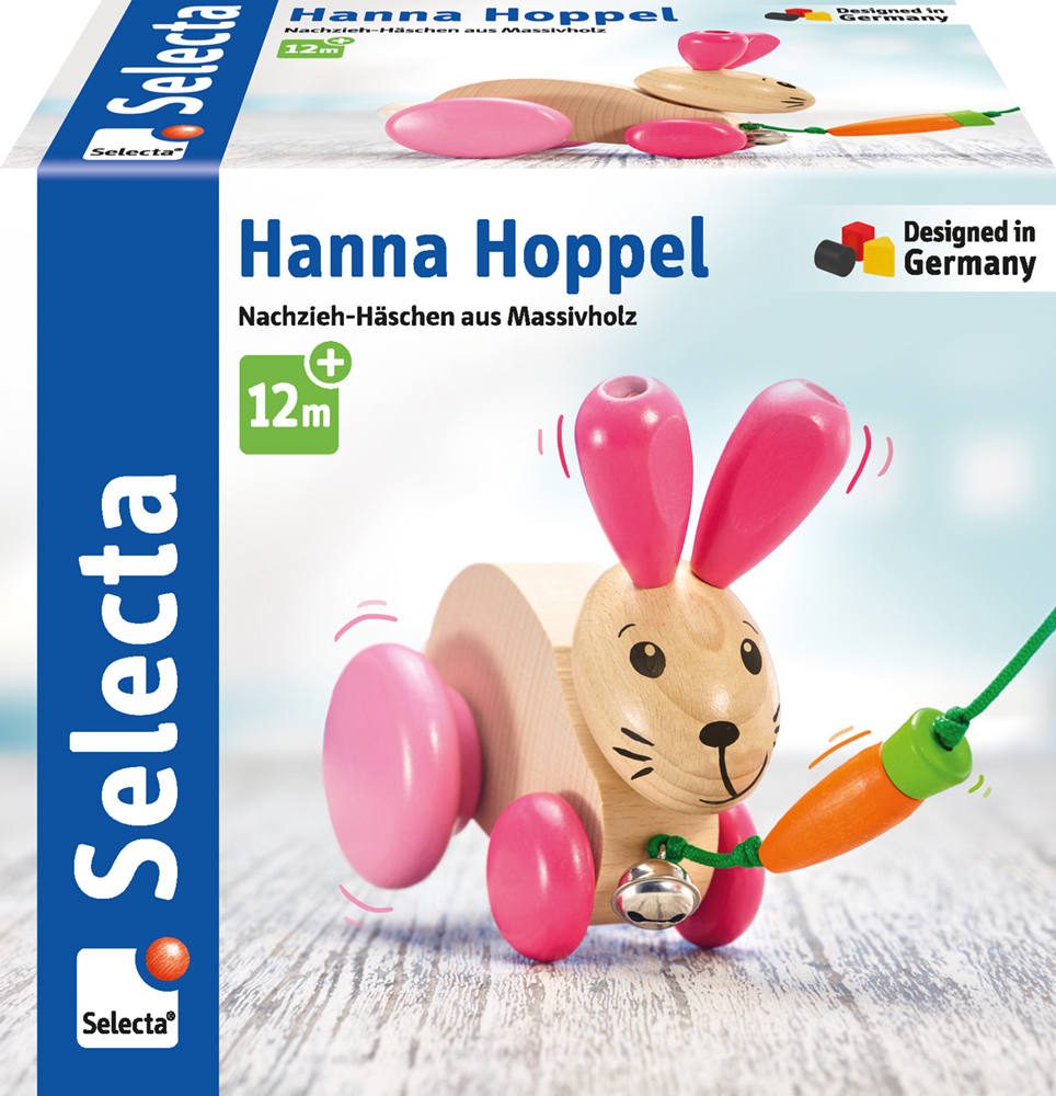 62026_Nico_FS33_042022-RZ Kopie Trekfiguur in de vorm van een haas, gemaakt van massief hout, met roze oren en wieltjes; houdt een wortel vast; geschikt voor kinderen van 12 maanden en ouder.